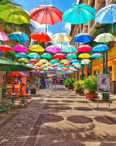 Colourful umbrellas above the walkway at Caudan Waterfront in Port Louis